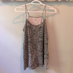 Lacy style patterned tank top.